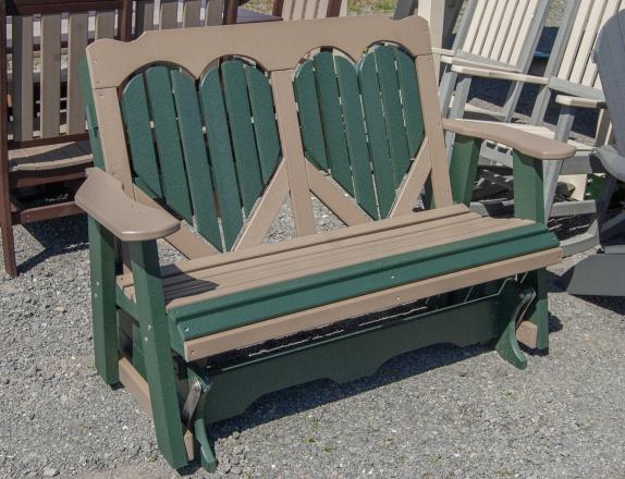 Four-foot poly glider with heart design in back slats in Turf Green and Weathered Wood colors