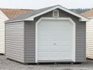 10x16 Front Entry Peak Style Storage Shed with Vinyl Siding, Gable End Vents, and 6 foot Overhead Garage Door